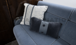 Dusty blue velvet upholstery with accent pillows on divan in Falcon 900