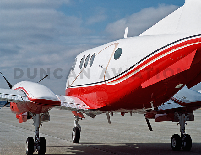 White and red paint on King Air F-90
