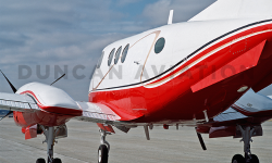 White and red paint on King Air F-90