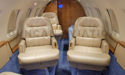 Cozy and warm interior of Hawker 800 with blue carpet accent