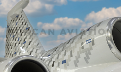 Exterior paint on Falcon 900 white with gray and blue accents