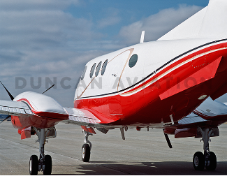 White and red paint on King Air F-90