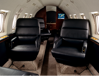 Sleek black upholstery in Hawker 800