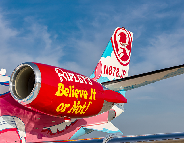 Engine and tail of the Ripley's Believe It or Not! Citation by Duncan Aviation featuring iconic Ripley's logo