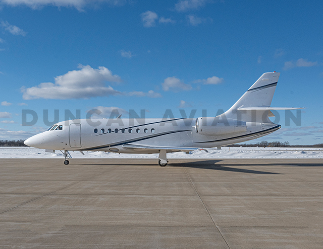 Exterior paint on Falcon 2000 in white with sweeping black accents