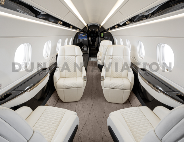 Cozy white updated interior of Embraer