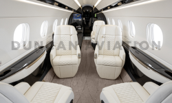 Cozy white updated interior of Embraer