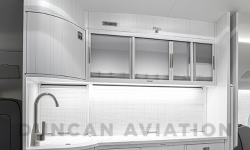 Sleek all white galley interior refurbishment in Falcon 2000