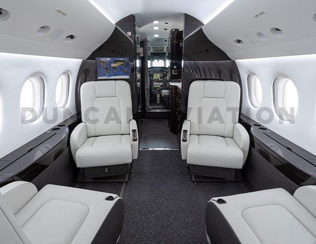 Black and white interior refurbishment of Falcon 2000