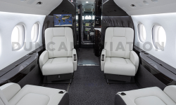 Black and white interior refurbishment of Falcon 2000