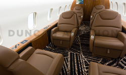 Interior of Challenger 300 with warm brown finishes