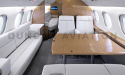 Refurbished interior of Falcon 900 with divan by Duncan Aviation